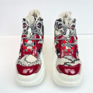 Anthony Wang
COLLECTION Red and White Platform Sneakers Women’s Size 8